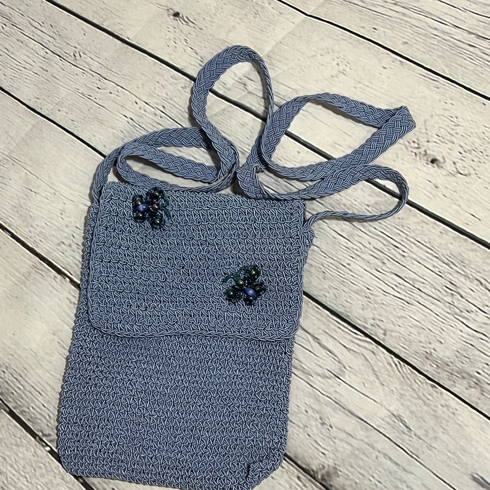 Baby blue knitted crossover purse